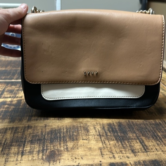 DKNY cross body purse preowned great condition. 10” wise by 7” length. - Picture 2 of 6